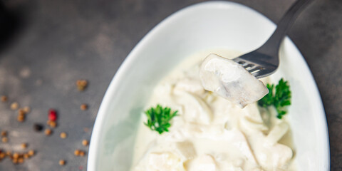 herring sour cream white sauce fresh healthy meal food snack on the table copy space food background