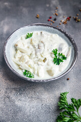 herring sour cream white sauce fresh healthy meal food snack on the table copy space food background