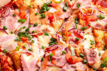 Pizza with Bacon, melted cheese, tomatoes, onion and spring onions
