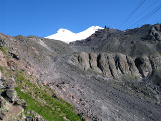 View from Mount Cheget to Mount Elbrus covered with snow, the highest mountain in Europe, the Caucasus, Kabardino-Balkaria, beautiful mountains landscape