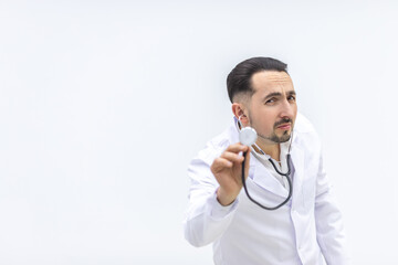 Close up photo of male mature doctor posing at camera with a stethoscope.