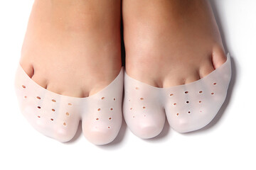 Silicone corrector for toes on a black background