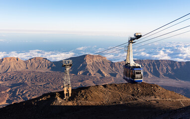 Cable car riding to the peak of Mount Teide called 'Pico del Teide'. View of the caldera and...