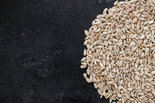 Sunflower Seeds Isolated On Black Background.