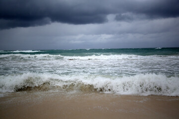 Ocean waves with dark sky