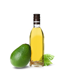 Cooking oil and ripe avocado on white background