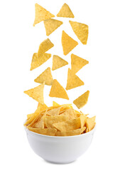 Tasty tortilla chips (nachos) falling into bowl on white background