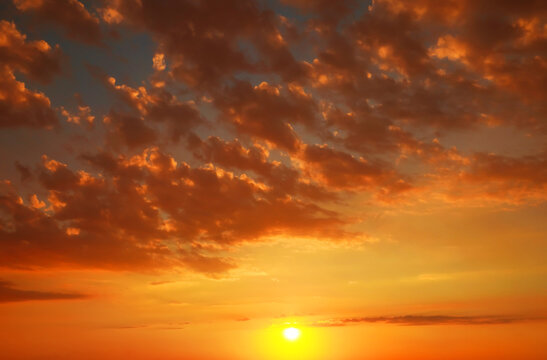 Beautiful view of orange sky with clouds at sunset