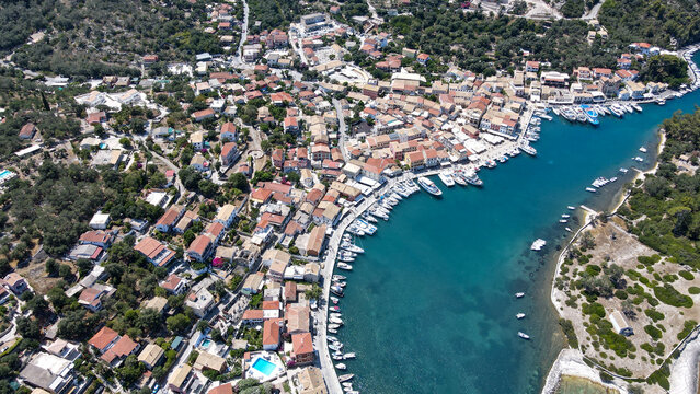 Scenic ionian islands of Greece - Paxos. view of Gaios Town aerial top view drone. Aerial drone photo of iconic port of Gaios a natural fjord bay ideal for safe anchorage in island of Paxos
