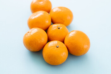 Tangerine orange on a blue background.