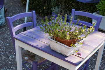 Rustic lavender table idea with flower decoration, purple chair , Provence, Tuscany, romantic dinner
