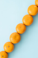 Tangerine orange on a blue background.