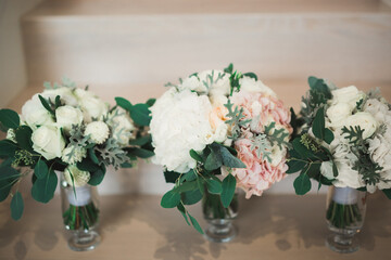 Beautiful wedding bouquet with different flowers, roses