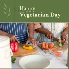 Composition of happy vegetarian day text over african american couple cooking in kitchen