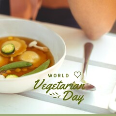 Fototapeta premium Composition of world vegetarian day text over soup on white background