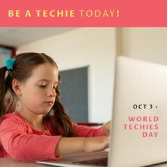 Fototapeta premium Composition of be a techie today and world techies day text over caucasian schoolgirl using laptop
