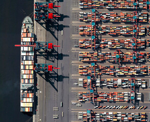 Trade, ships and containers port of Hamburg,  looking down aerial view from above, bird’s eye...