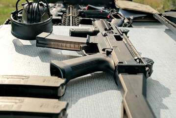 military weapon lies on the table. pistol . weapons at the shooting range