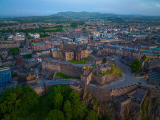 Edinburgh Castle at sunset, the castle is a historic castle stands on Castle Rock in Old Town Edinburgh, Scotland, UK. Old town Edinburgh is a UNESCO World Heritage Site since 1995. 