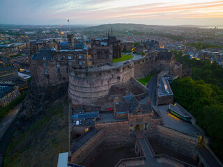 Edinburgh Castle at sunset, the castle is a historic castle stands on Castle Rock in Old Town Edinburgh, Scotland, UK. Old town Edinburgh is a UNESCO World Heritage Site since 1995. 