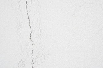 cracked concrete on white wall texture background