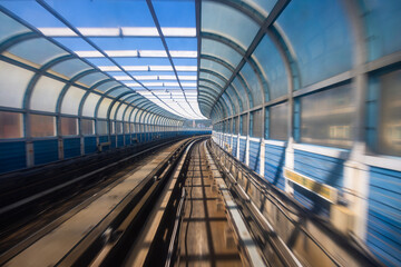 Motion blur of train moving inside tunnel