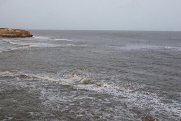 Beautiful Seascape in beach diu. Sightseeing in Diu Places to Visit in Diu Island. India, Diu island. Natural landscape of sandy shore of Arabian sea. UT of Dadra Nagar Haveli and Daman and Diu India.