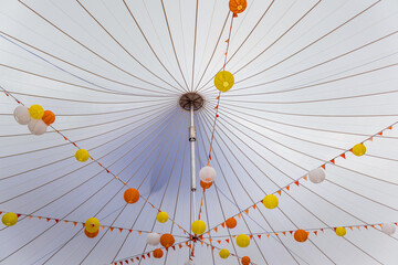 Party tent with colorful lanterns, outdoor decoration for a party