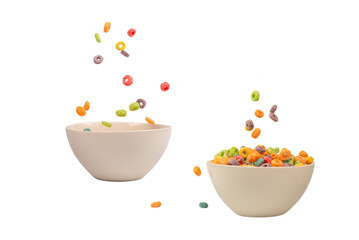 Colorful cereal box for morning breakfast. Corn flakes falling to the white bowl. Motion.