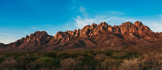 Tableaux ronds sur aluminium Bleu Jeans Organ Mountains at sunset in Las Cruces, panorama, desert landscape with mountains