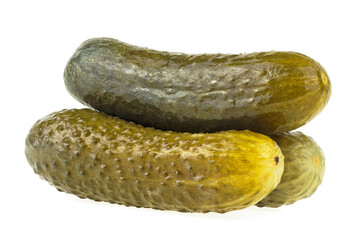 Three marinated pickled cucumbers isolated on a white background