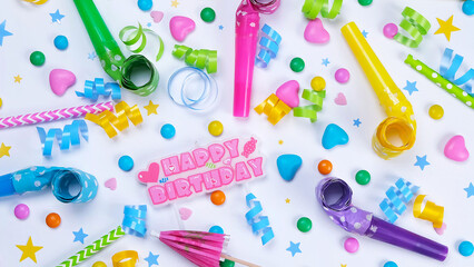  white background with candies, balloons and tubes for birthday or party celebration,concept for birthday,anniversary,congratulations