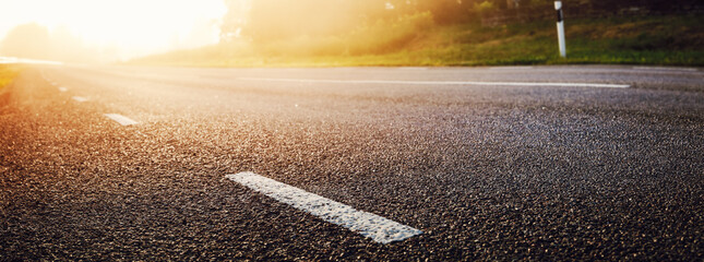 Black Asphalt Road And White Dividing Lines