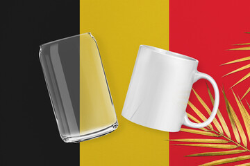 Patriotic can glass and mug mock up on background in colors of national flag. Belgium
