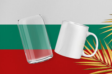 Patriotic can glass and mug mock up on background in colors of national flag. Bulgaria