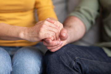 Support In Marriage. Closeup Shot Of Man And Woman Holding Hands Together