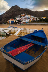 Old fishing boats on Las Teresitas beach in front of San Andres village, Santa Cruz de Tenerife, Tenerife, Canary Islands, Spain