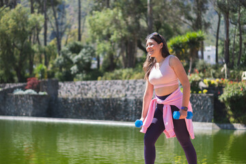 Young woman doing different sports activities, outdoors in a park.
