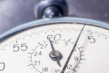 Dial of an old mechanical stopwatch close-up