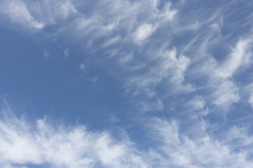 Light clouds are blown like sand
