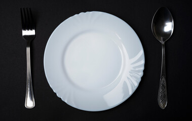 plate with cutlery on the table