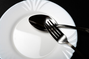 plate with cutlery on the table
