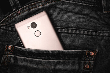 Phone in your pocket. Phone sticking out of pants pocket