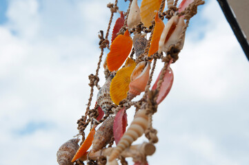 Decorative shell net. Shell net hanging sky background. Shell mobile crafts