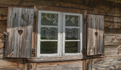 open the old windows, heart in the shutters