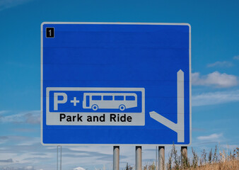A British motorway sign directing to a park and ride location at the next junction