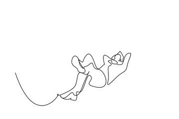 the person who comfortably puts his hands behind his head lies on the floor