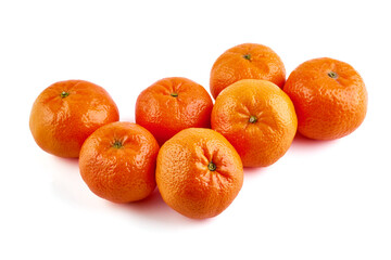 Tangerine or clementine, close-up, isolated on a white background.