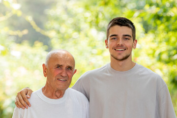 portrait of grandfather with grandson