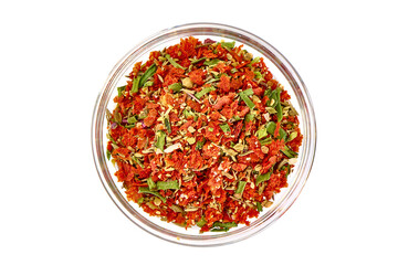 Seasonings for Spaghetti alla puttanesca, spicy condiments in bowl, isolated on white background.